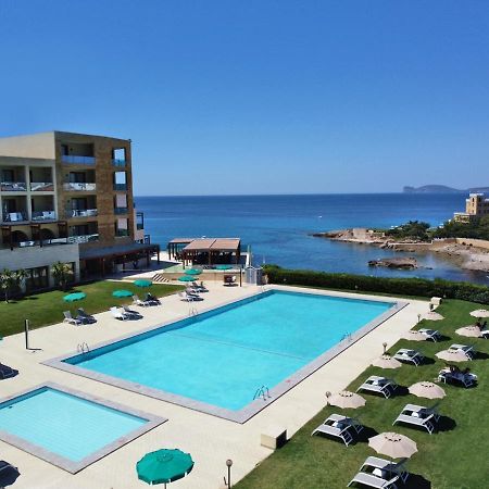 Smy Carlos V Wellness & Spa Alghero Esterno foto The hotel's swimming pool
