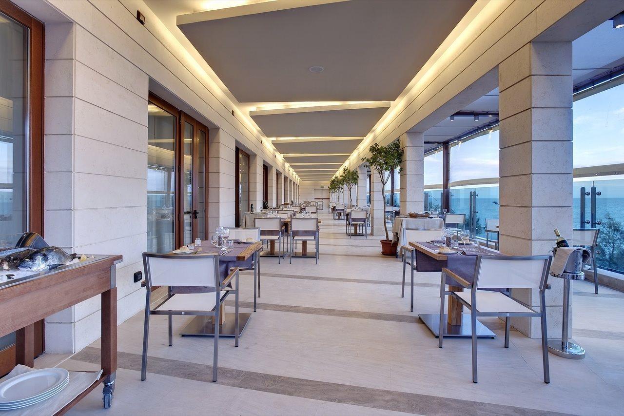 Smy Carlos V Wellness & Spa Alghero Esterno foto The restaurant