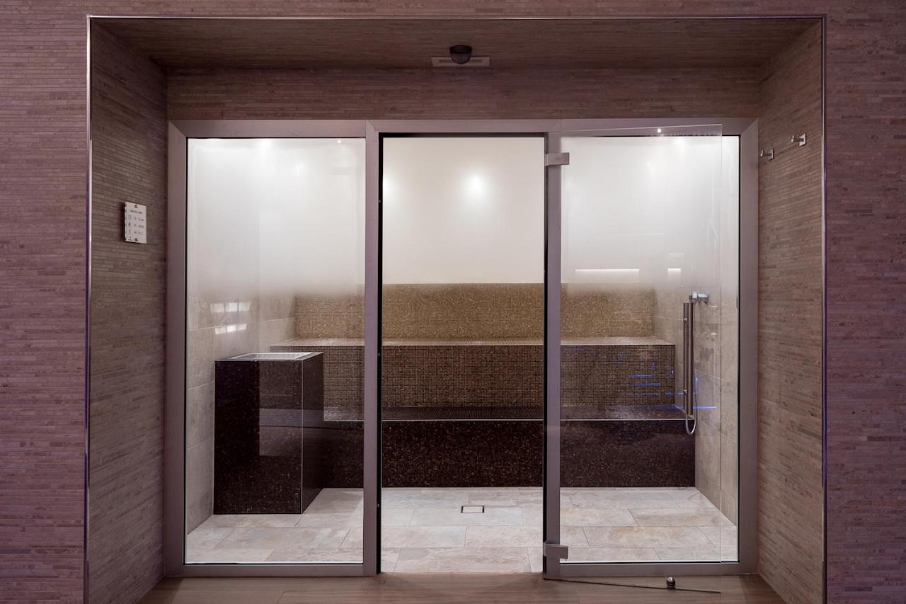 Smy Carlos V Wellness & Spa Alghero Esterno foto A modern Japanese onsen