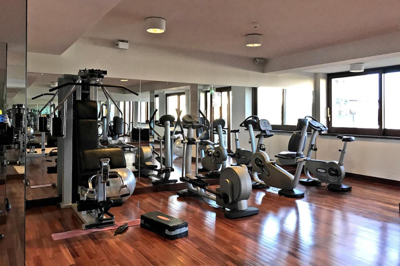 Smy Carlos V Wellness & Spa Alghero Esterno foto The gym at the hotel