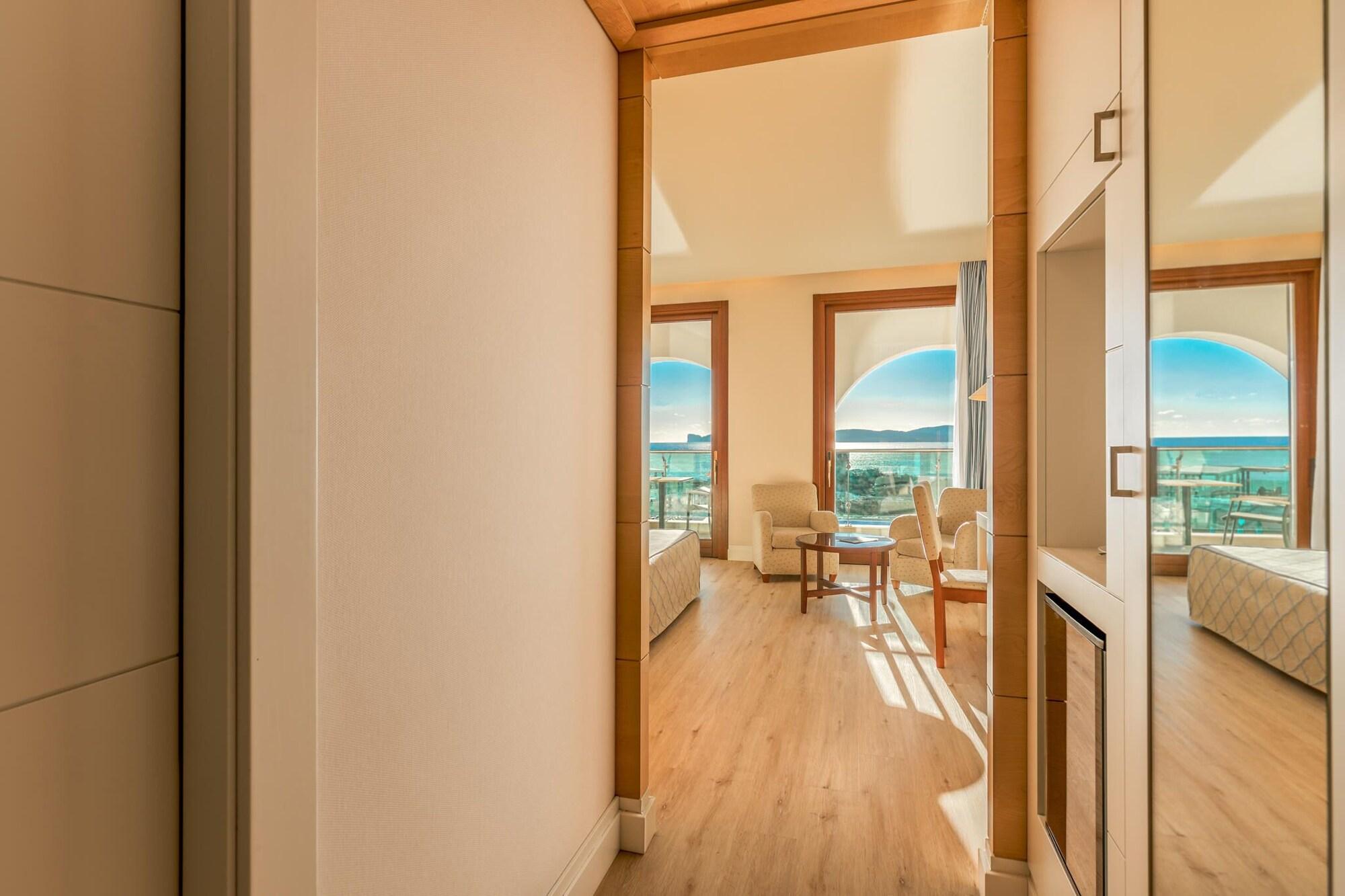 Smy Carlos V Wellness & Spa Alghero Esterno foto A room at the hotel