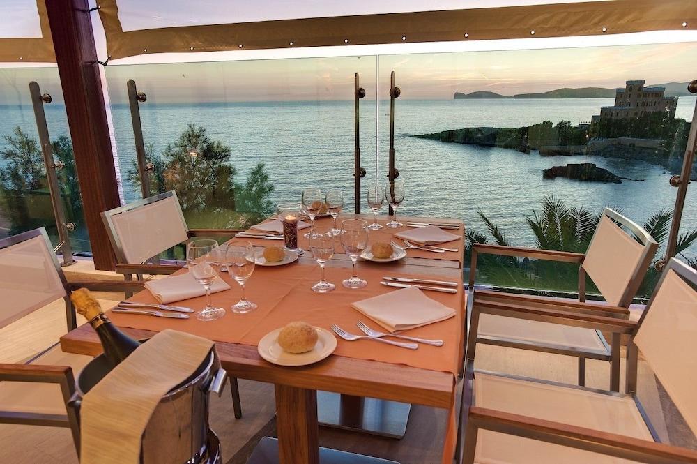 Smy Carlos V Wellness & Spa Alghero Esterno foto The restaurant